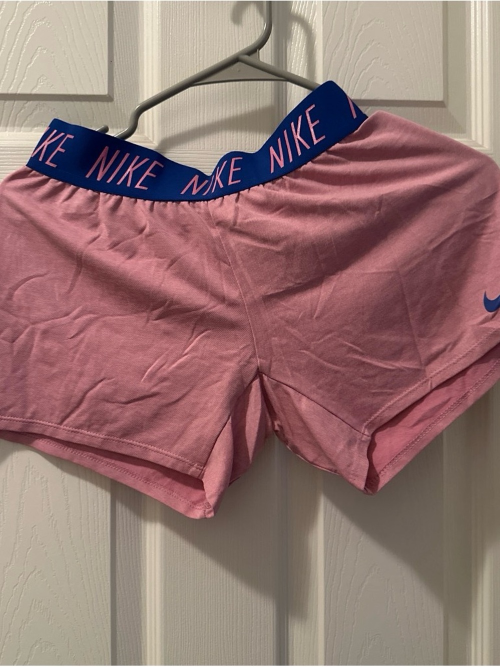 Nike Pink Athletic Shorts with Blue Branded Waistband